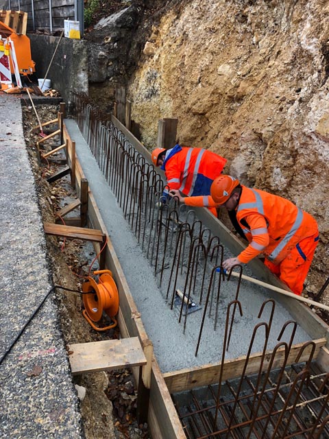 Bau der Pilot-Stützmauer aus RC-Beton. Foto: Kanton Basel-Landschaft